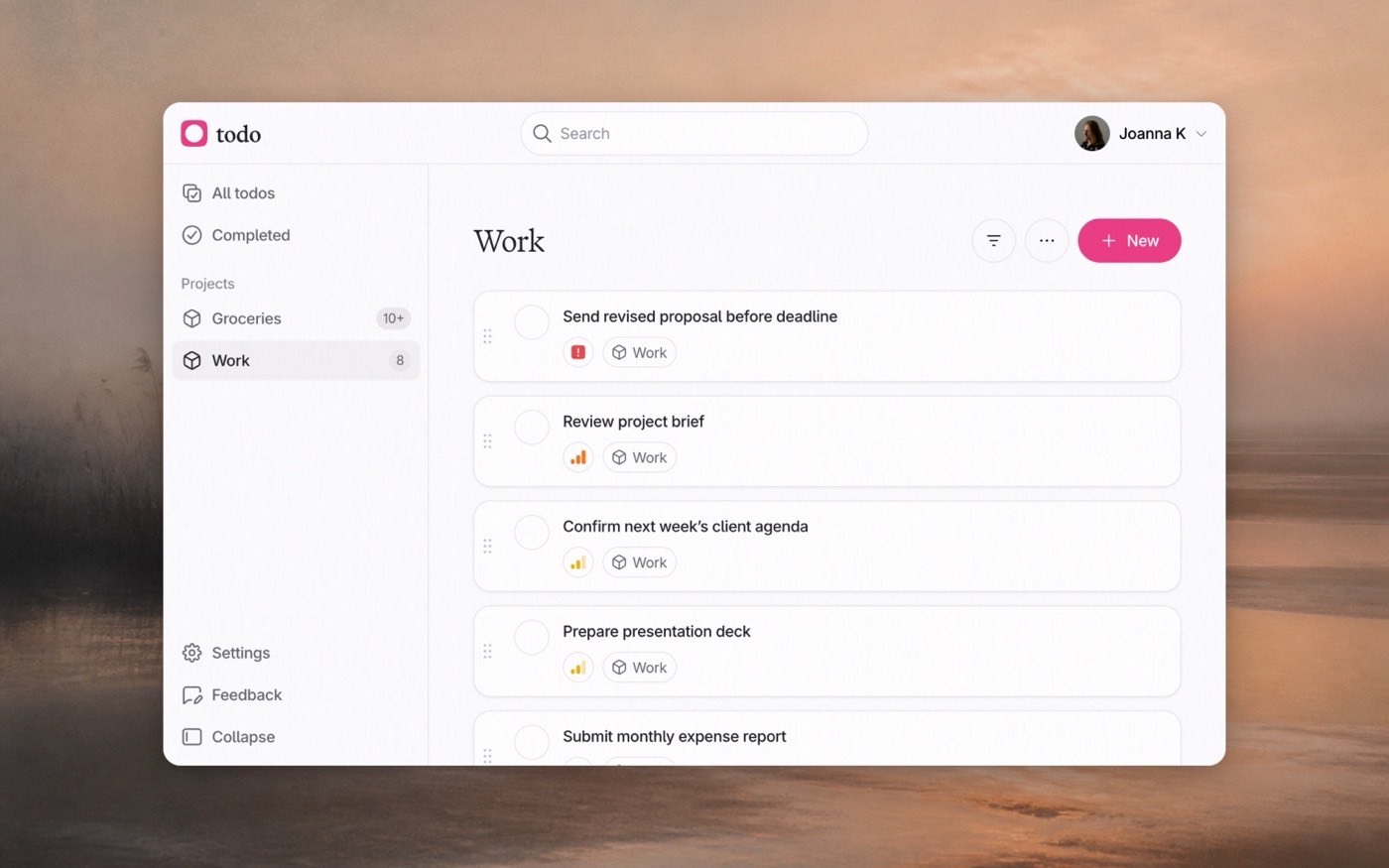 Todo app over a soft sunset landscape background